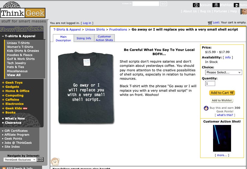 A ThinkGeek t-shirt printed with the slogan “Go away or I will replace you with a very small shell script.” A ThinkGeek t-shirt printed with the slogan “Go away or I will replace you with a very small shell script.”
