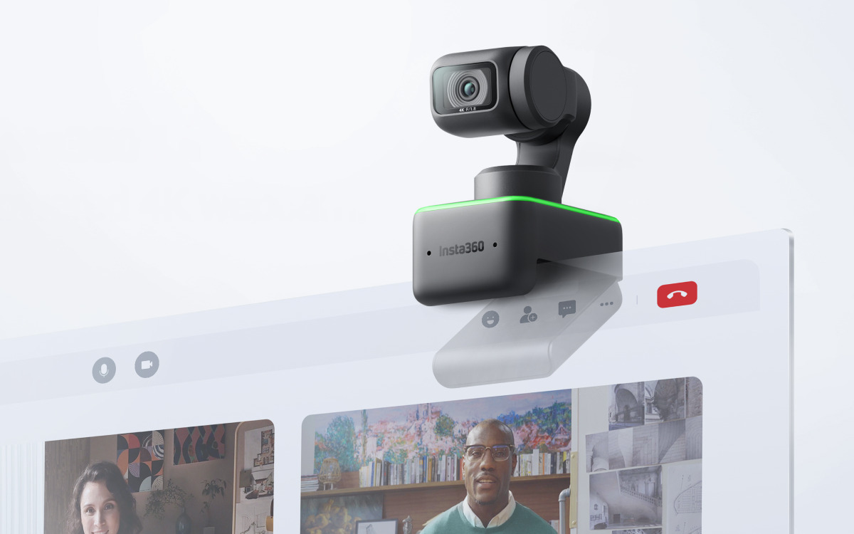 Insta360 Link webcam, its green activity LED lit
